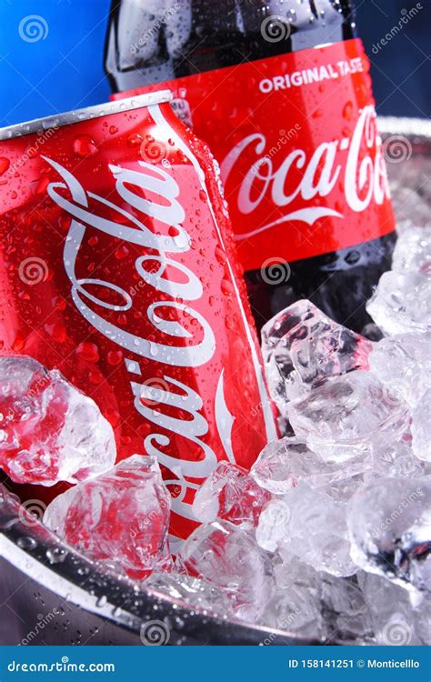 Bottle And Can Of Coca Cola In Bucket With Crushed Ice Editorial Photo