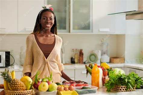 Premium Photo Woman Standing At Kitchen Counter