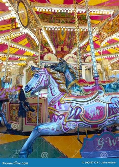 Brightly Coloured Horses On The Carousel Stock Photo Image Of Fayre