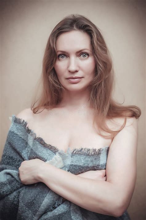 Portrait Of A Beautiful Nude Woman Wrapped In A Checkered Plaid Stock