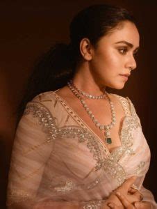 Amruta Khanvilkar In An Ivory Striped Saree For OTT Filmfare 2020