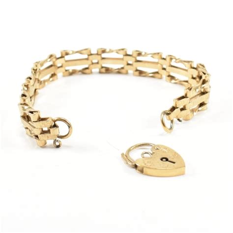 A S Rolled Gold Excalibur Hinged Buckle Bangle Together With A