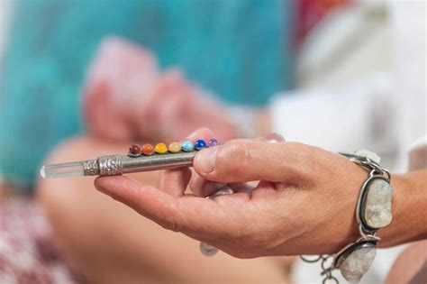 Premium Photo Crystal Healing Therapy With 7 Chakra Healing Wand