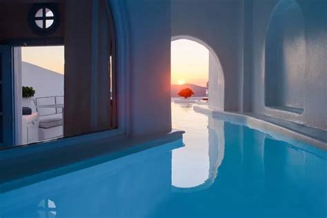 This Santorini Hotel Has Rooms With Secret Tunnels Leading To Hidden Infinity Pools And The