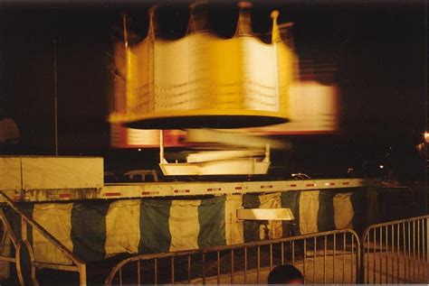 A Retro Carnival Tilt O Whirl Ride Photograph by Jennifer Holcombe