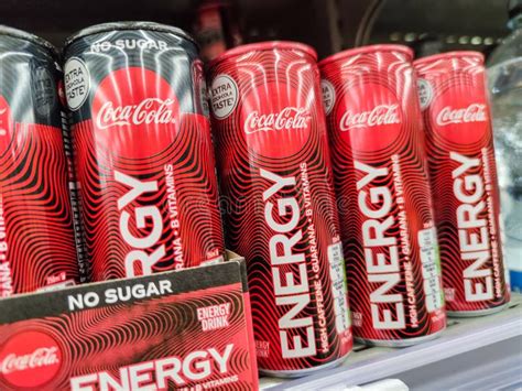 Row Of Coca Cola Energy Drink Display For Sell In The Supermarket