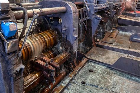 The Process Of Rolling Hot Rolled Steel In A Rolling Mill Stock Photo