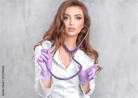 Sexy Girl Doctor In A White Coat With A Stethoscope Stock Photo Adobe