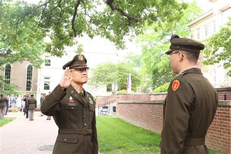 Army Chaplain Administers Oath To Son During Rotc Commissioning