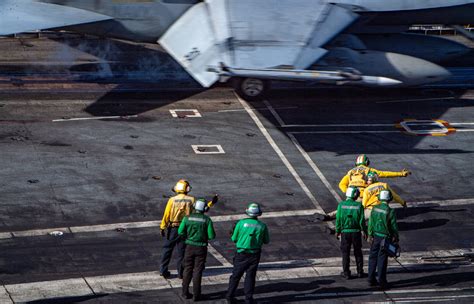 An F A 18E Super Hornet Prepares To Take Off From The Flight Deck Of