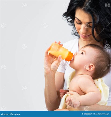 Mother with baby stock photo. Image of adorable, cuddling - 69032334