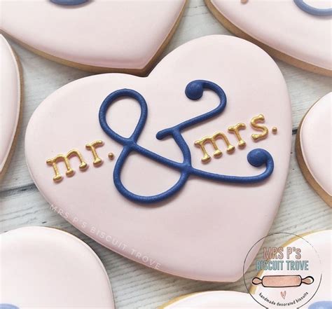 Decorated Cookies Arranged In The Shape Of Hearts With Mr And Mrs