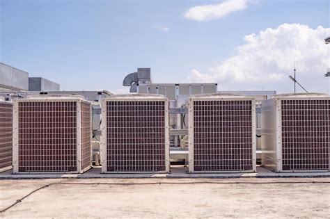 Premium Photo Array Of Outdoor Fan Air Conditioner On The Roof Top