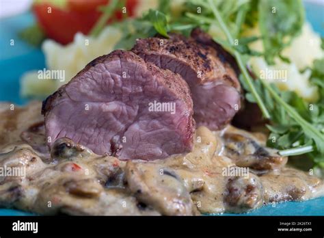 pork fillet with mushroom sauce Stock Photo - Alamy