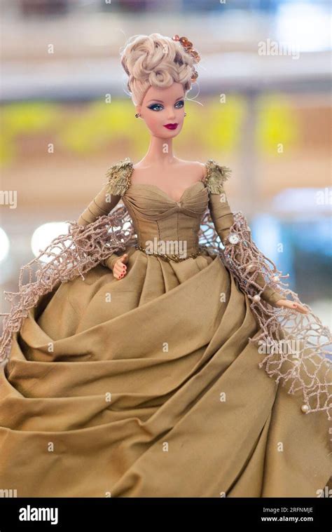A Barbie doll is displayed at the 'Barbie Film and Fashion' exhibition ...