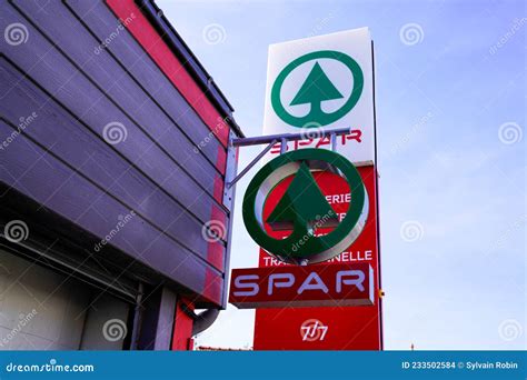 Spar Tree Logo And Round Sign On Supermarket Wall Facade Retailer Chain