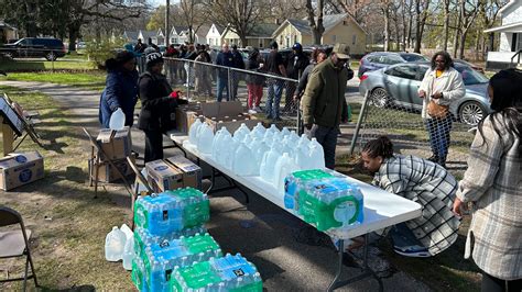 Water Distribution Site Set Up By Neighbors In Muskegon Heights