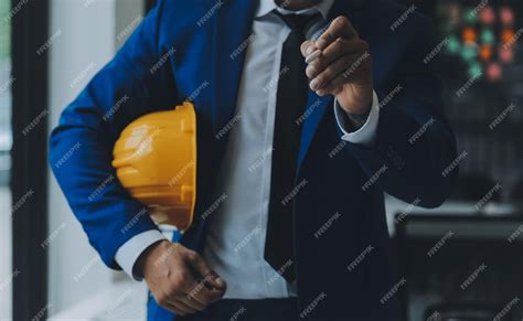 Premium Photo Civil Engineer Hispanic Smiling With Constuction