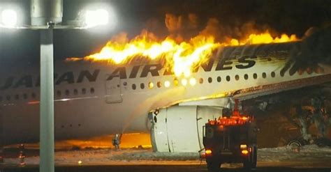 Japan Airlines Plane Bursts Into Flames After Possible Crash With