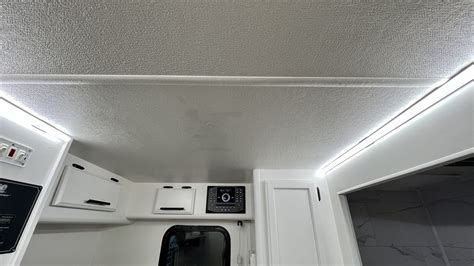 How to Update Old RV Ceiling Panels - Getaway Couple