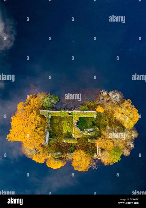 Aerial View Of Autumn Colours At Ruined Castle On Island On Loch An