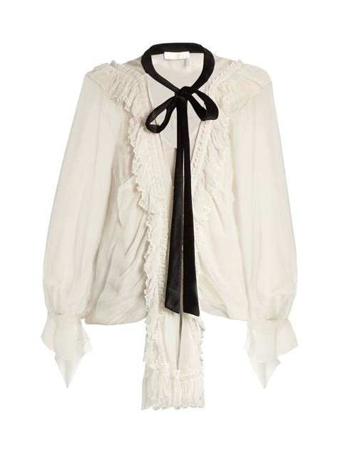 Click here to buy Chloé Ruffle trimmed oversized silk crepon blouse at