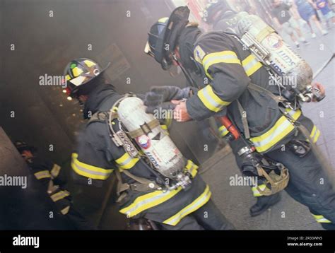 Firemen Entering Smoking Building Hi Res Stock Photography And Images