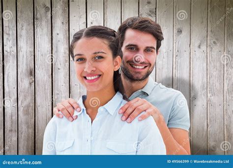 Composite Image Of Cute Couple Smiling At Camera Stock Image Image Of