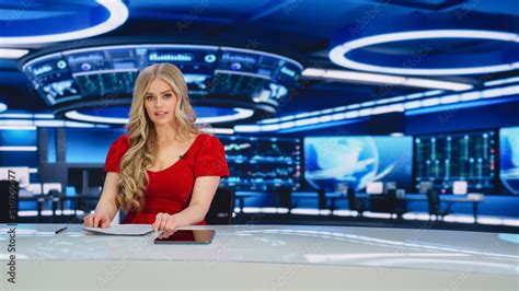 TV Live News Program: Professional Female Presenter Reporting on Current Events. Television ...