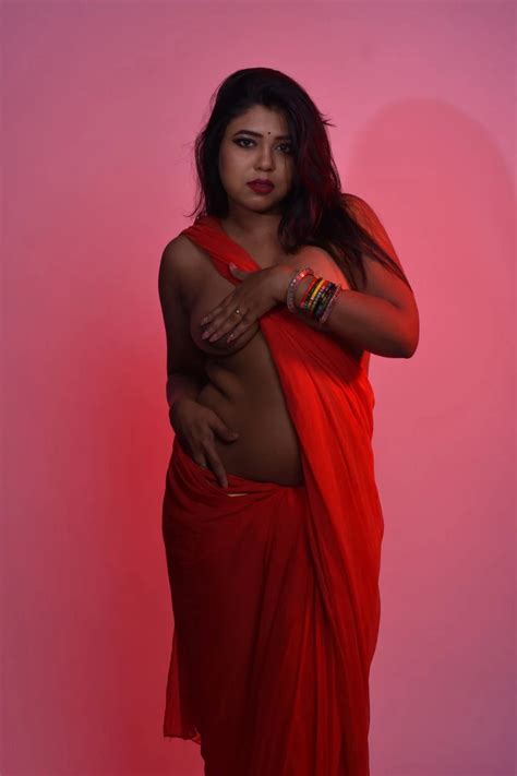 Desi MILF Model Hides Her Topless Tits While Posing Almost Topless In