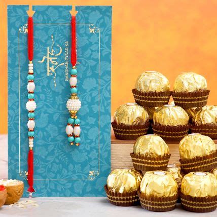 Online Blue Pearl And Lumba Rakhi Set With 16 Pcs Ferrero Rocher Gift