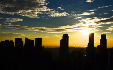 Silhouette Photo Of City Building During Sunset · Free Stock Photo