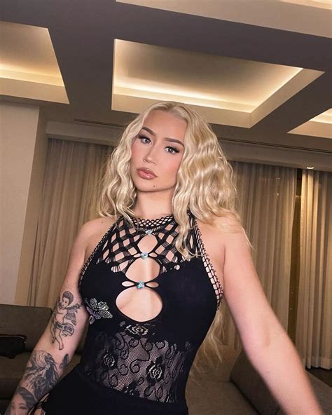 Iggy Azalea Tempts Fans In Shiny PVC Lingerie As She Reveals Curves On
