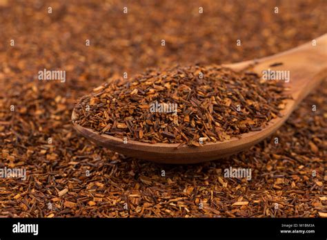 Heap Of Red Dry Rooibos Healthy Traditional Organic Tea In Spoon Stock