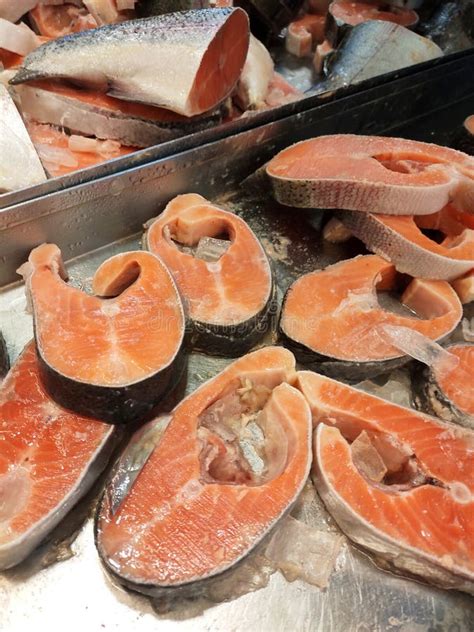 Tuna Fish Is Cut Into Slices For Sale And Displayed For Sale In The