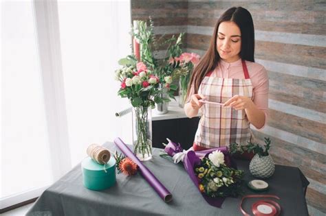 Premium Photo Female Florist At Work Pretty Young Dark Haired Woman