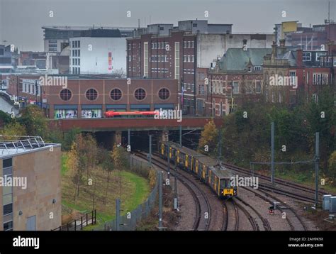 Nexus Tyne and Wear Metro cars departing from Sunderland railway ...