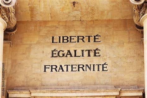 The famous French motto "Liberté, Égalité, Fraternité" in English ...