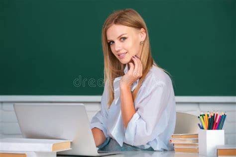 Portrait Of A Young Confident And Amazed Female Student Studying In