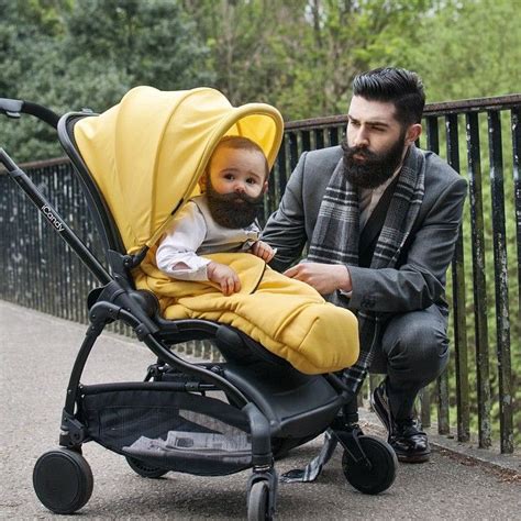 Chris John Millington Poses With A Bearded Baby Full Thick Dark Beard