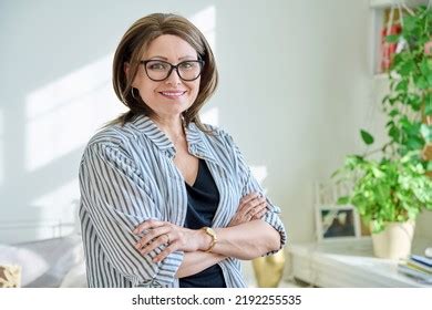 Portrait Confident Mature Woman Looking Camera Stock Photo 2192255535 Shutterstock