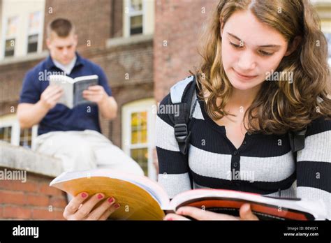 Two Students Reading Books Stock Photo Alamy