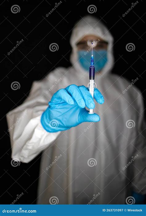 Health Worker Wearing Protective Clothing And Masks While Working With Vaccines Stock Image