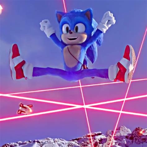 Sonic The Hedgehog Is Flying Through The Air With His Legs Spread Out