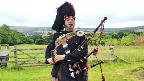 Highland Bagpiper With Dhol Drummer Playing Scotland The Brave Youtube