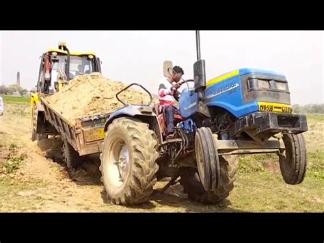 Jcb 3dx Eco Xcellence Machine Loading Mud In Sonalika 35 Di Rx Tractor