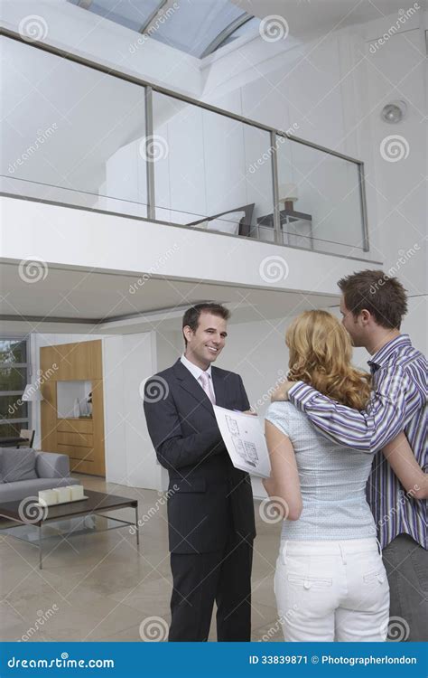 Real Estate Agent Showing Couple New Home Stock Image Image Of Home