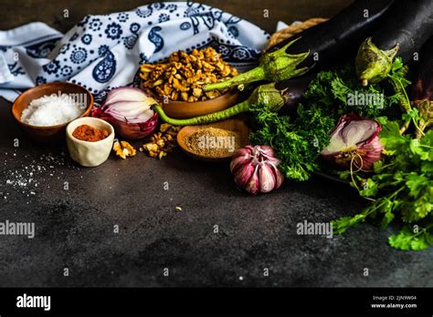 Cooking Of Famous Georgian Dish From Eggplants With Walnuts On Dark