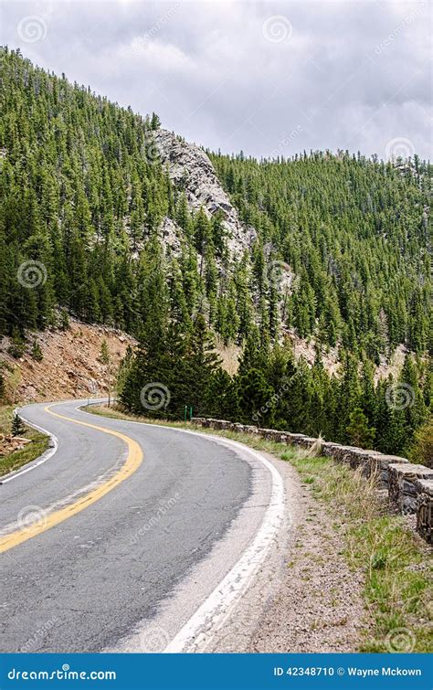 Rocky mountain road stock photo. Image of seasonal, pine - 42348710