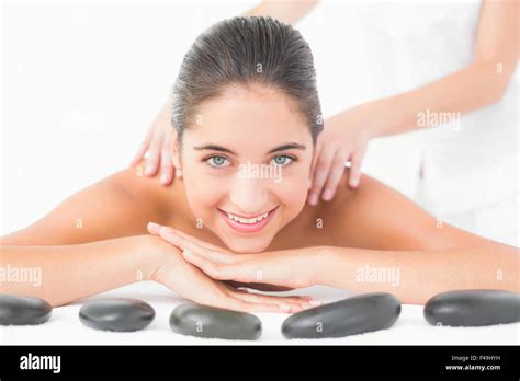 Brunette Enjoying Hot Stone Massage Hi Res Stock Photography And Images Alamy